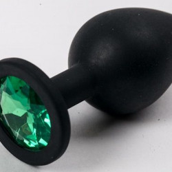 Черная силиконовая анальная пробка с зеленым стразом - 8,2 см.